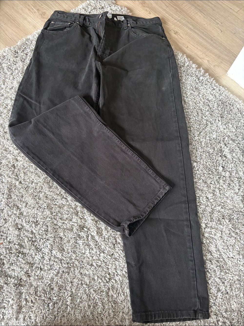 Calvin Klein Jeans charcoal black denim with logo button
